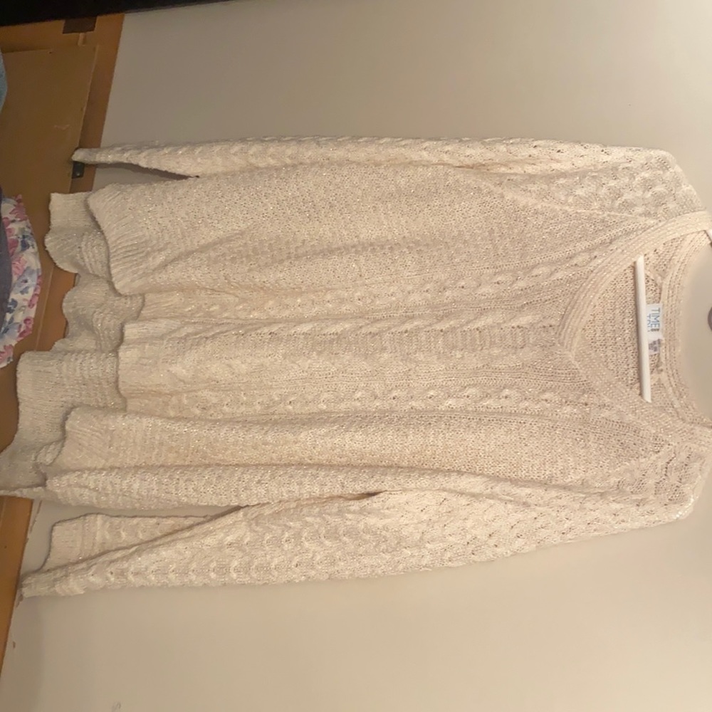 Cream colored women’s sweater